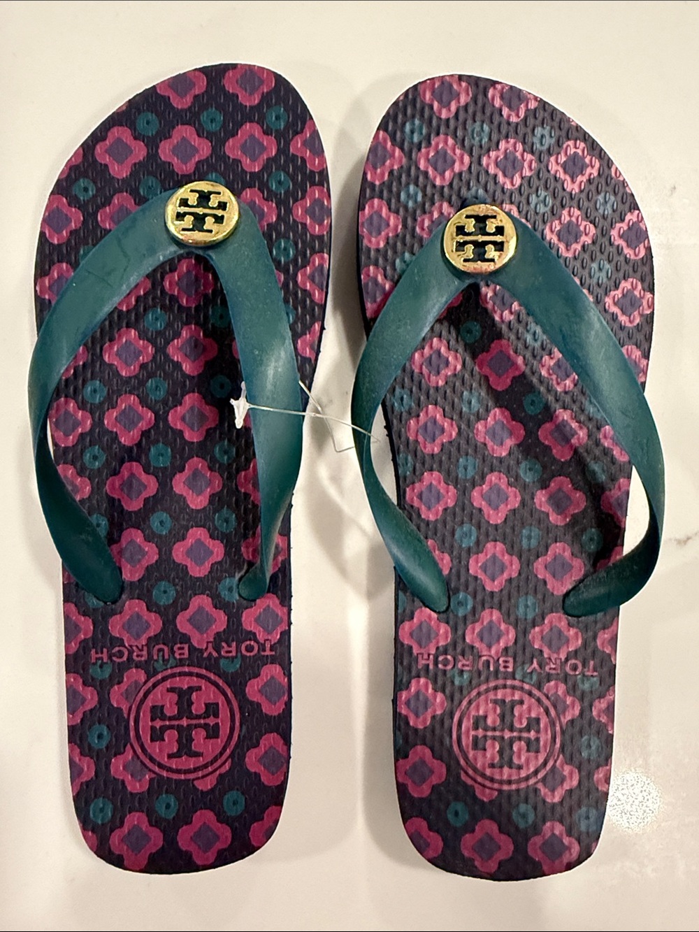 Tory Burch Pink Patterned Flip Flops with Teal Straps and Gold Logo